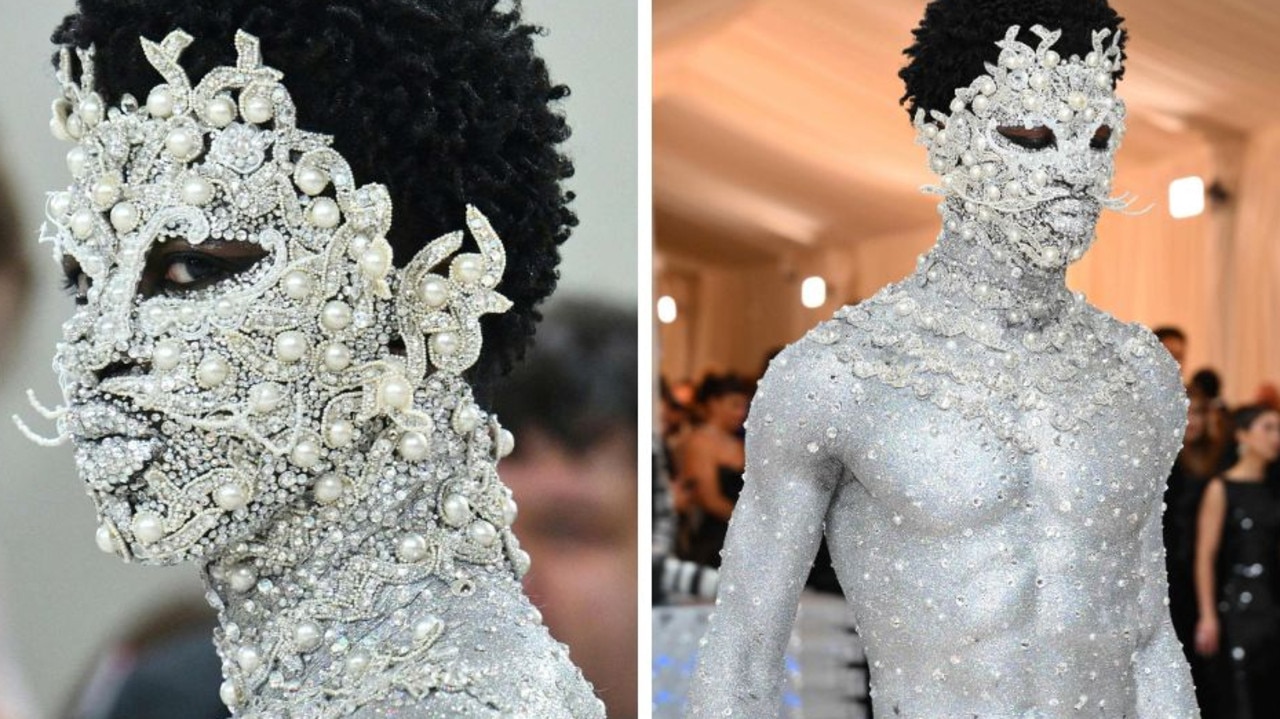 Lil Nas X covers body in silver paint, rhinestones for 2023 Met Gala