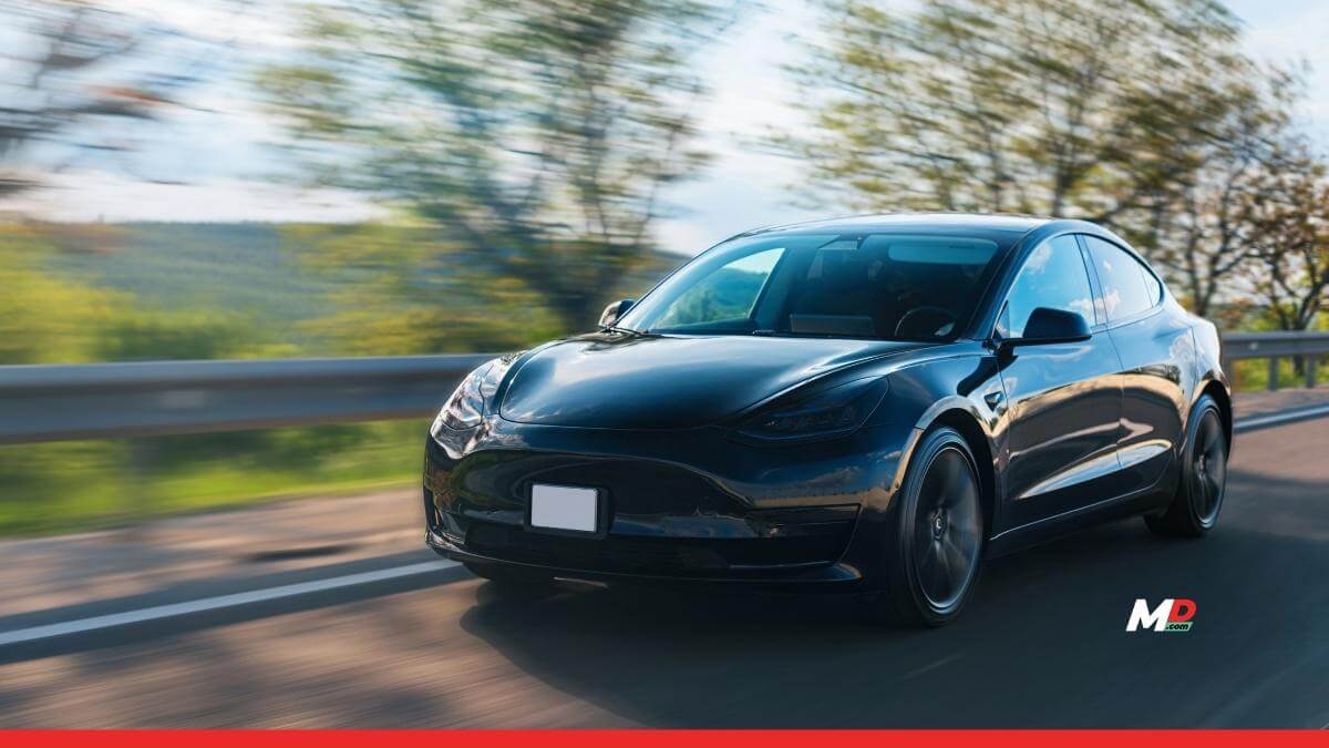 Tesla’s profits sink by 25% even as revenues surge 